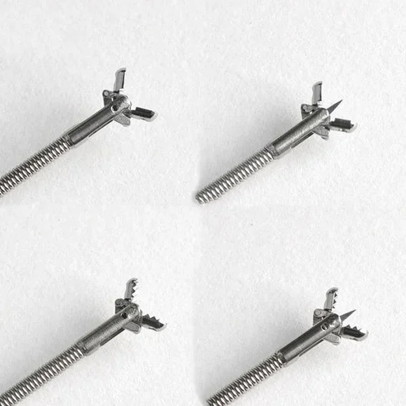 Disposable biopsy forceps for flexible endoscopes with coated and uncoated